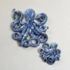 Pieuvre en céramique murale – Collection Mer & Écumes Bleu marine Pieuvre en céramique murale – Collection Mer & Écumes Bleu marine